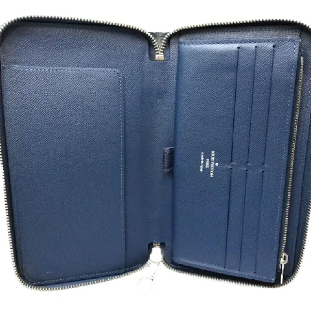 Louis Vuitton Vintage Pre-owned Leather wallets Blue Heren