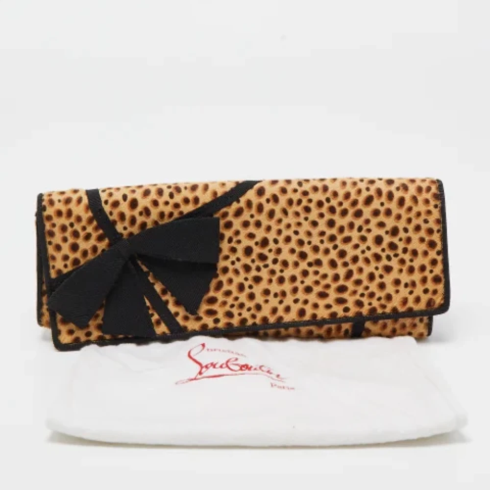 Christian Louboutin Pre-owned Canvas clutches Beige Dames