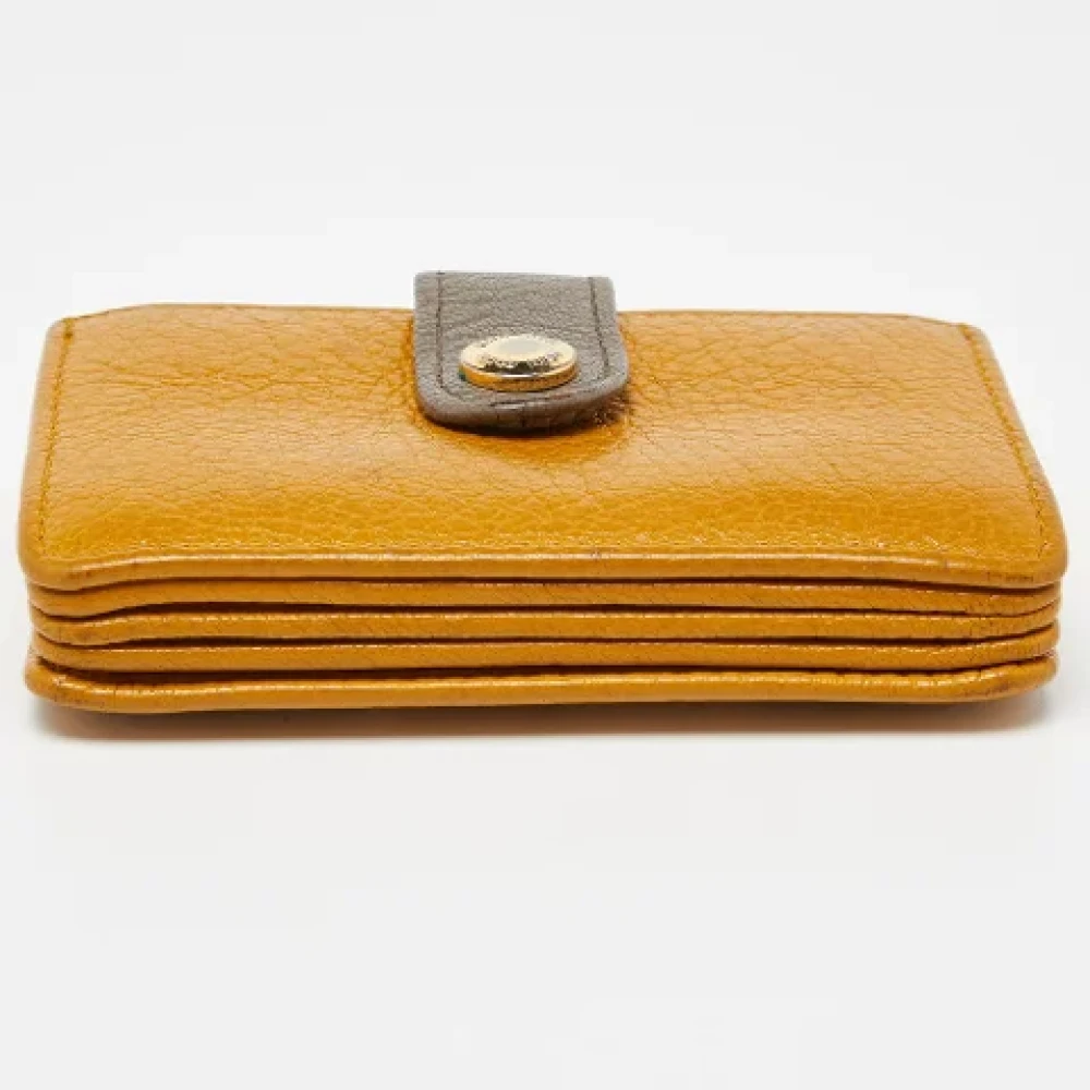 Miu Pre-owned Leather wallets Yellow Dames