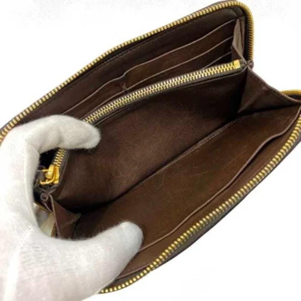 Miu Pre-owned Leather wallets Brown Dames