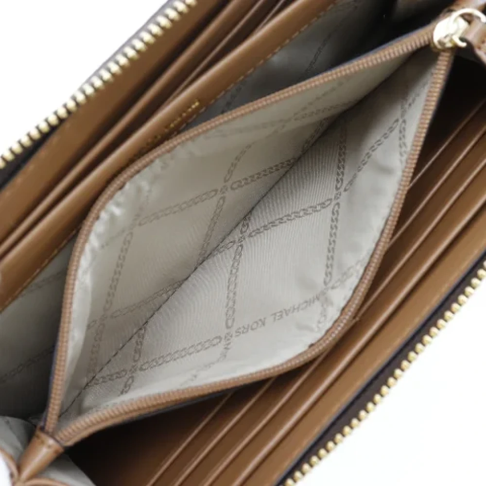 Michael Kors Pre-owned Leather wallets Brown Dames