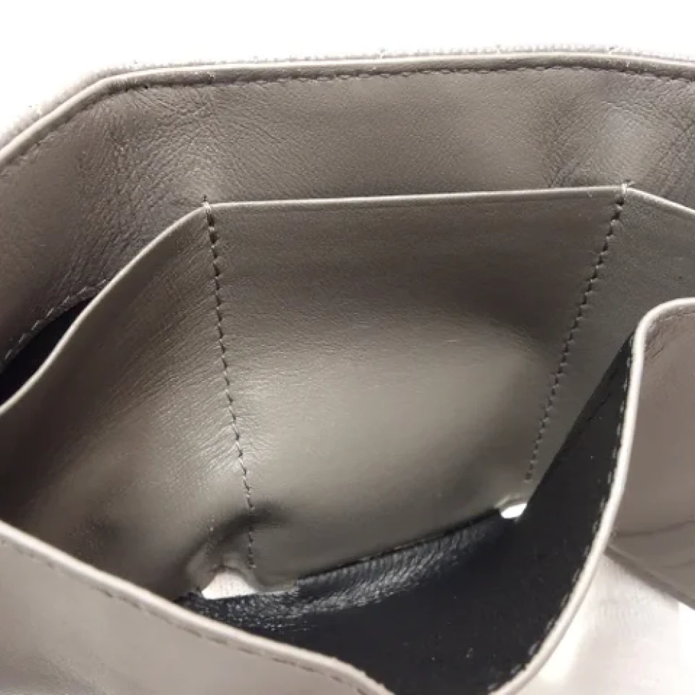 Yves Saint Laurent Vintage Pre-owned Leather wallets Gray Dames