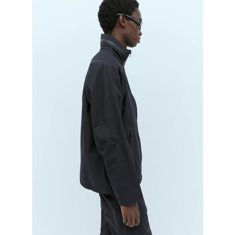 66 North Paclite Shell Jas met Capuchon Black Heren