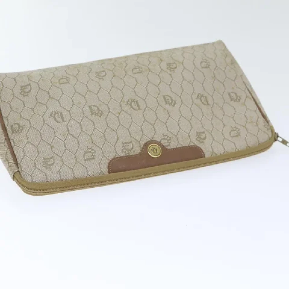 Dior Vintage Pre-owned Leather clutches Beige Dames