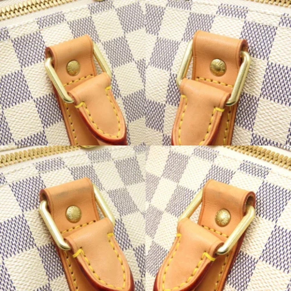 Louis Vuitton Vintage Pre-owned Fabric handbags White Unisex