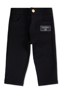 pantalon-decontracte-noir-avec-bouton-dore