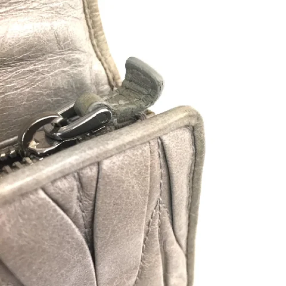 Miu Pre-owned Leather wallets Gray Dames