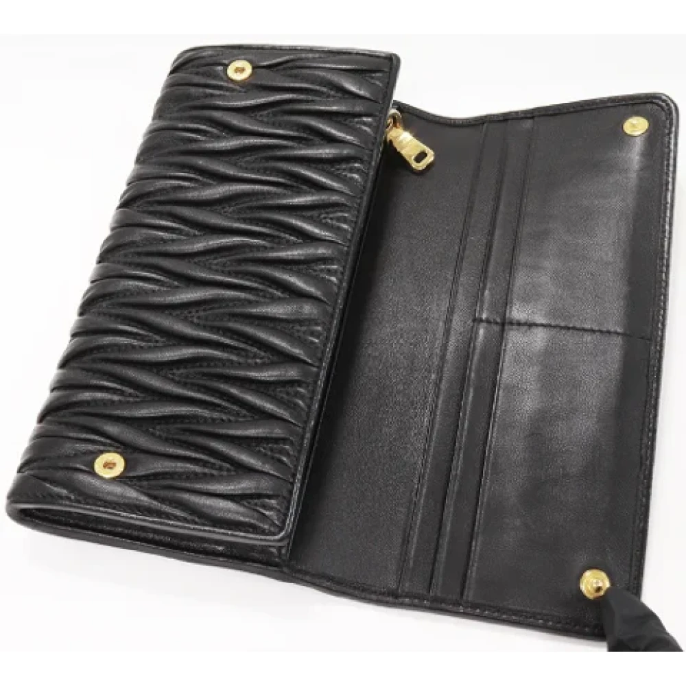 Miu Pre-owned Leather wallets Black Dames