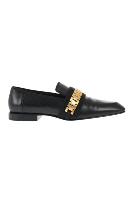 black-leather-loafers-with-golden-detail