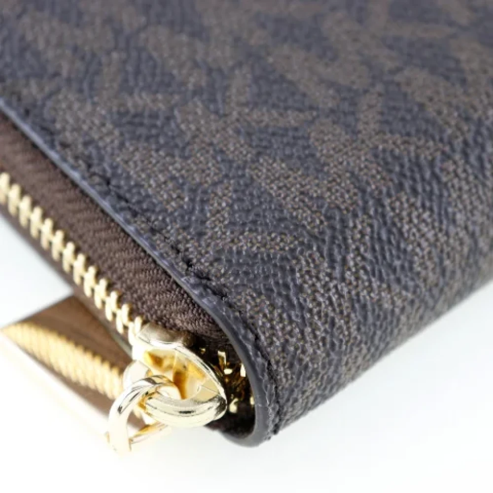 Michael Kors Pre-owned Leather wallets Brown Dames