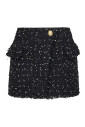 jupe-mini-en-tweed-a-pois-noirs