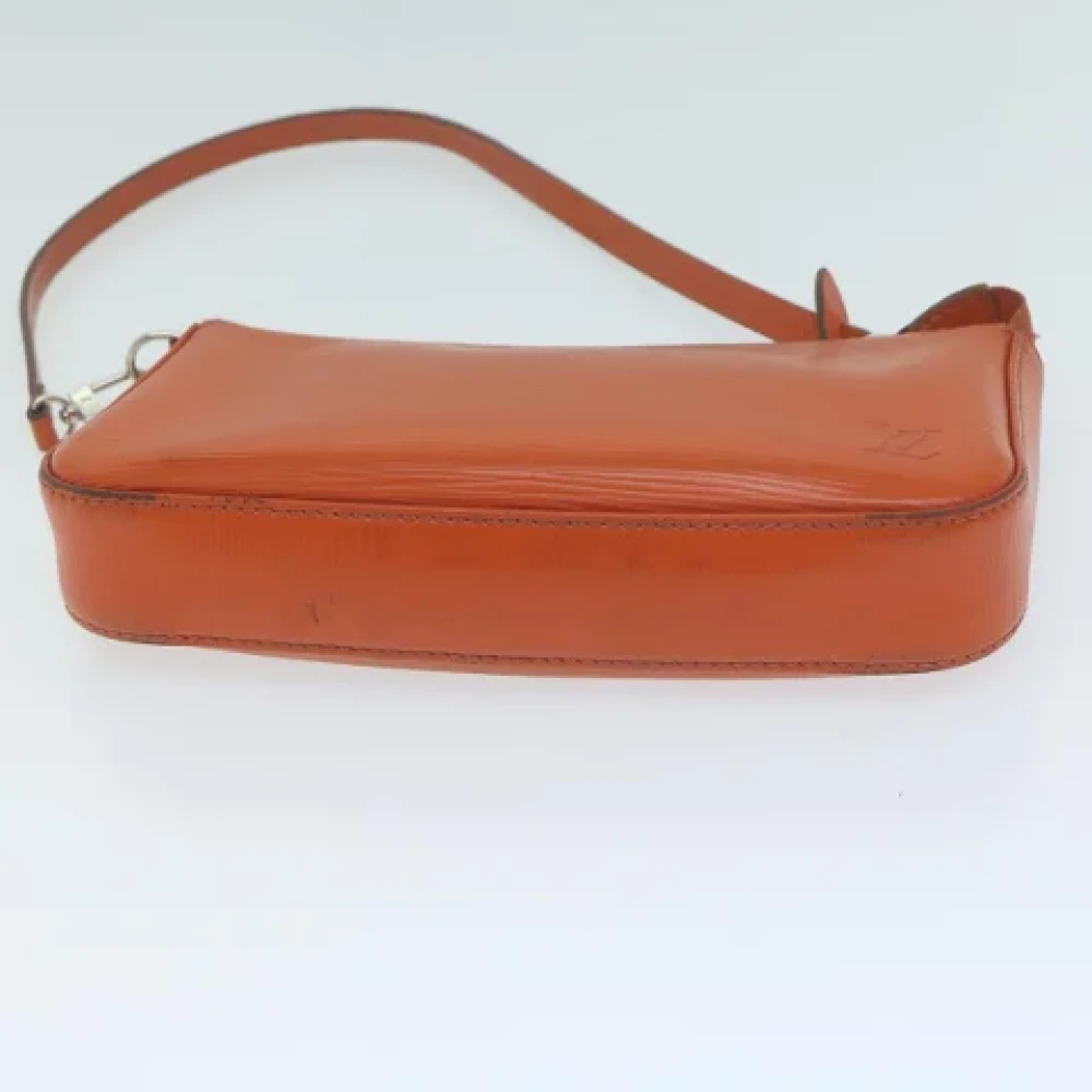 Louis Vuitton Vintage Pre-owned Leather pouches Orange Dames