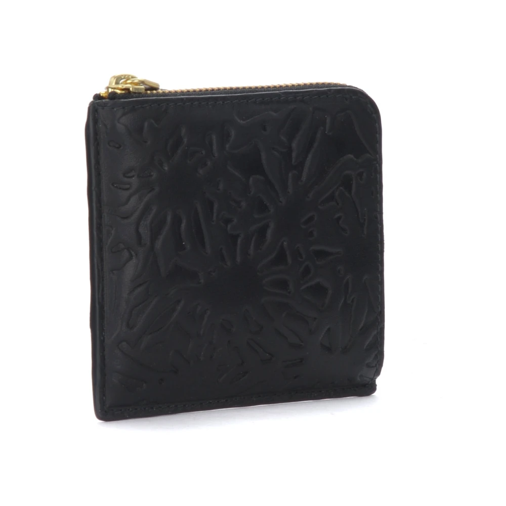 Comme des Garçons Geëmbosteerd bosleren portemonnee met gouden logo Black Unisex