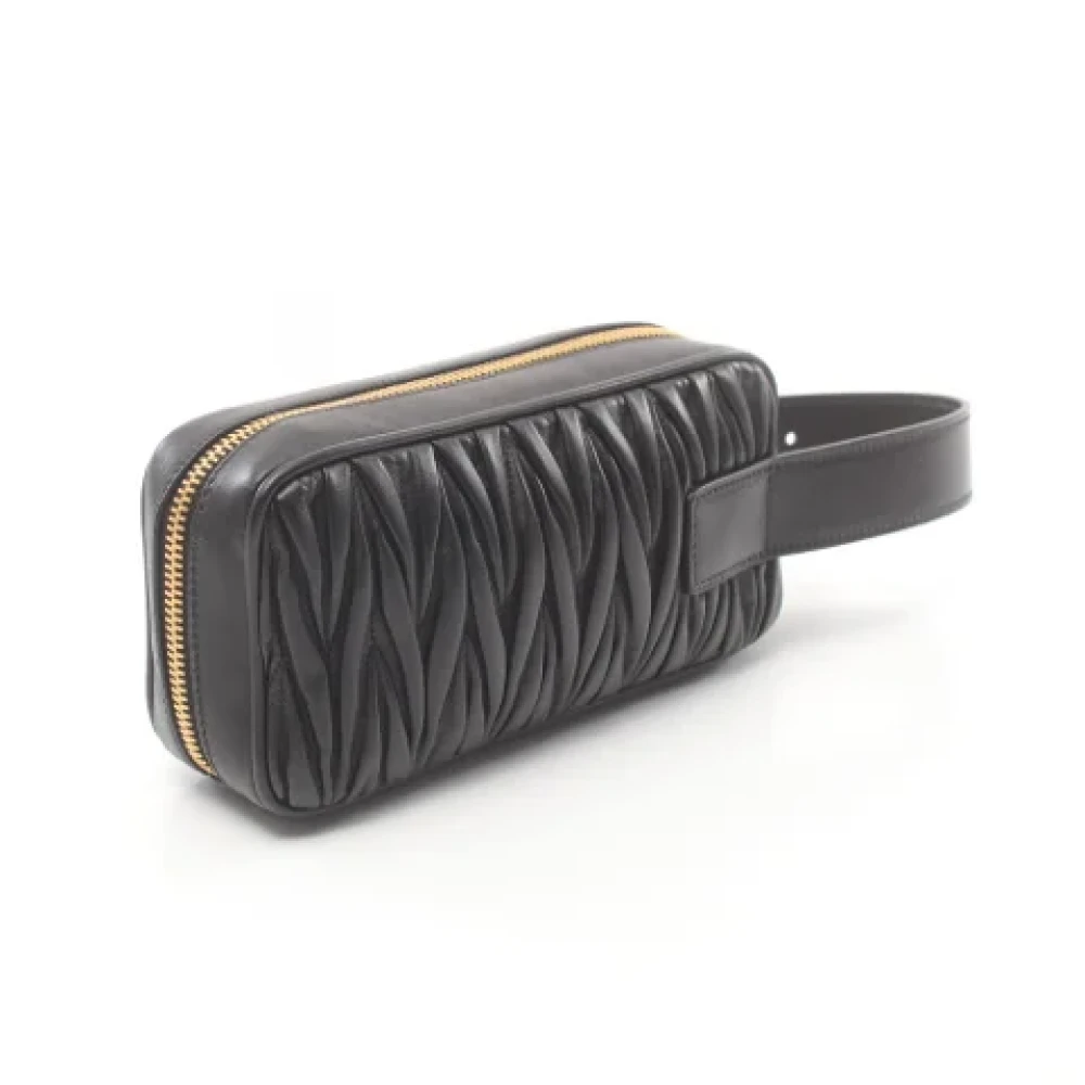 Miu Pre-owned Leather clutches Black Dames
