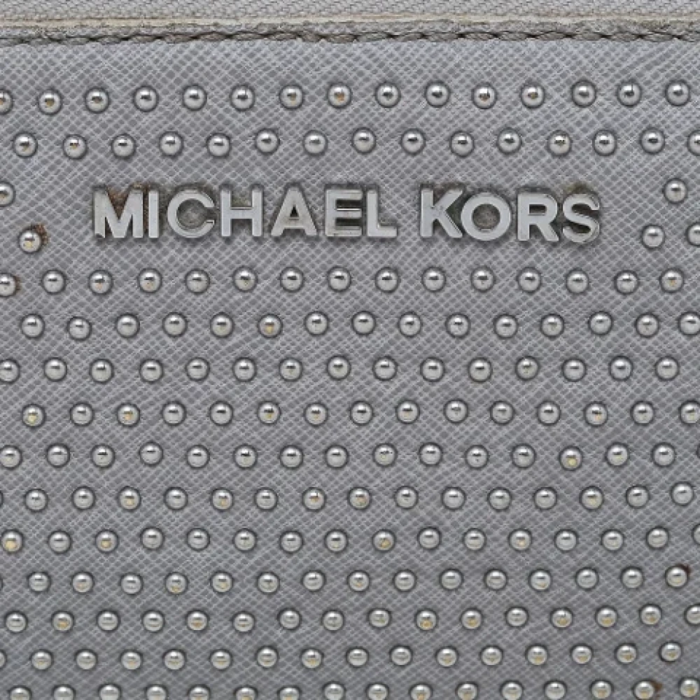 Michael Kors Pre-owned Leather wallets Gray Dames