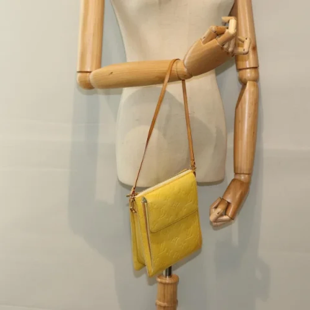 Louis Vuitton Vintage Pre-owned Leather clutches Yellow Dames