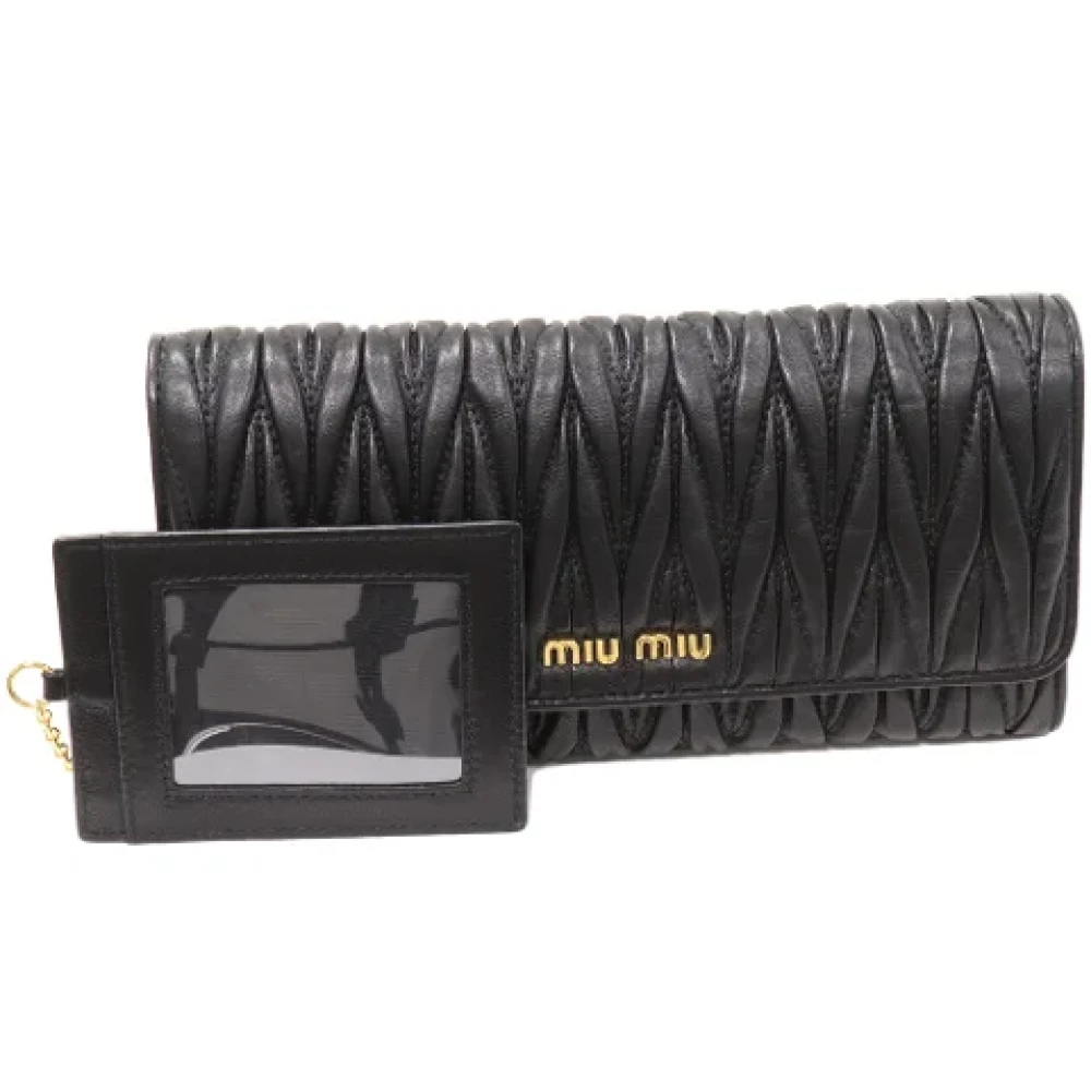 Miu Pre-owned Leather wallets Black Dames
