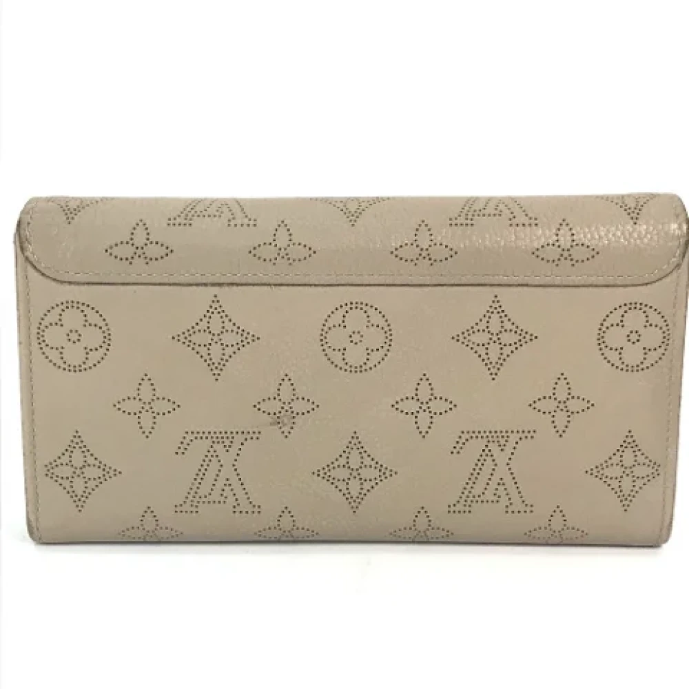 Louis Vuitton Vintage Pre-owned Leather wallets Beige Dames