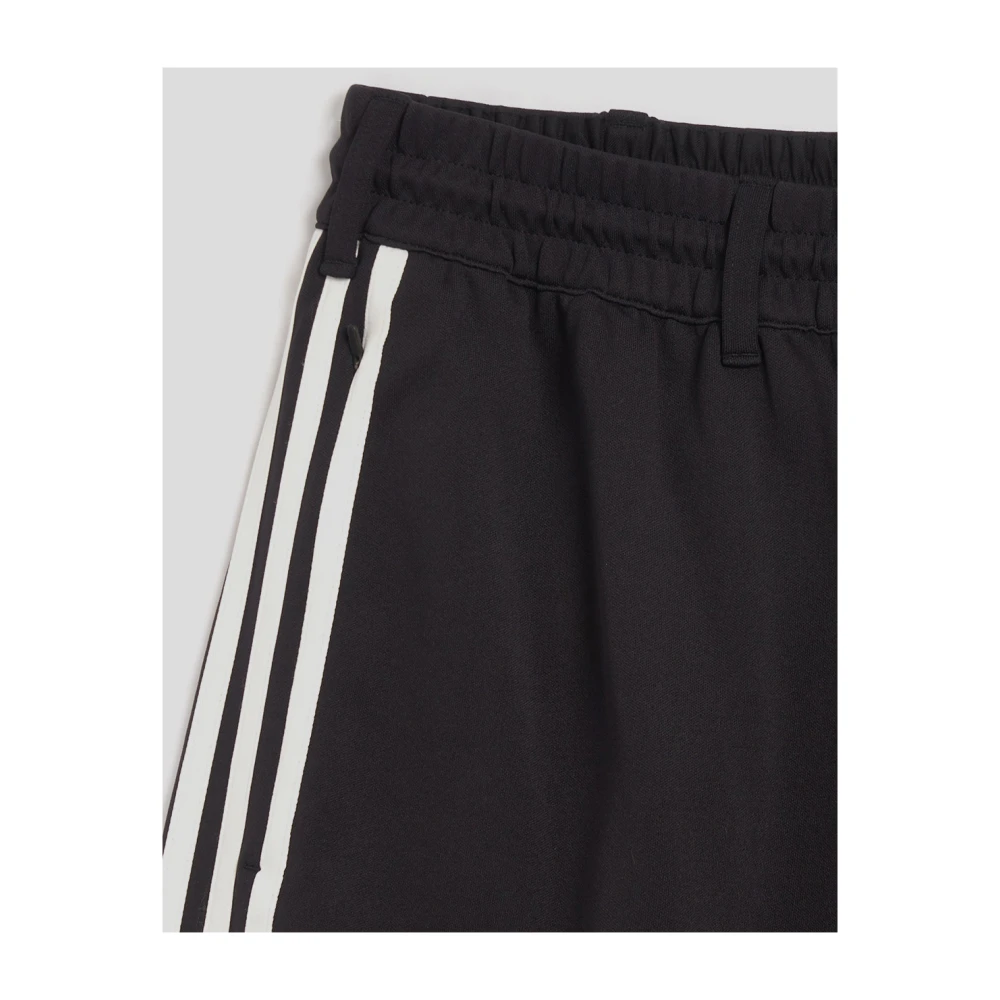 Y-3 Gestreepte synthetische trackbroek Black Dames