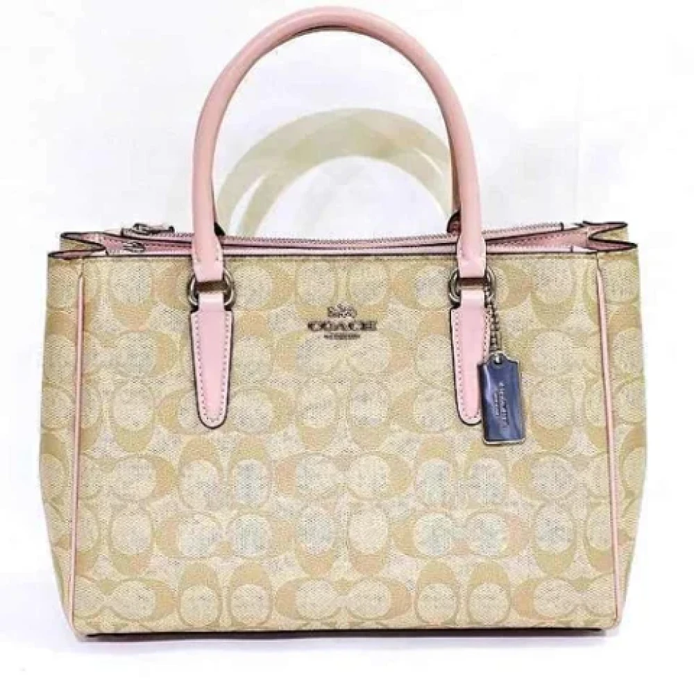 Coach Pre-owned Plastic handbags Beige Dames