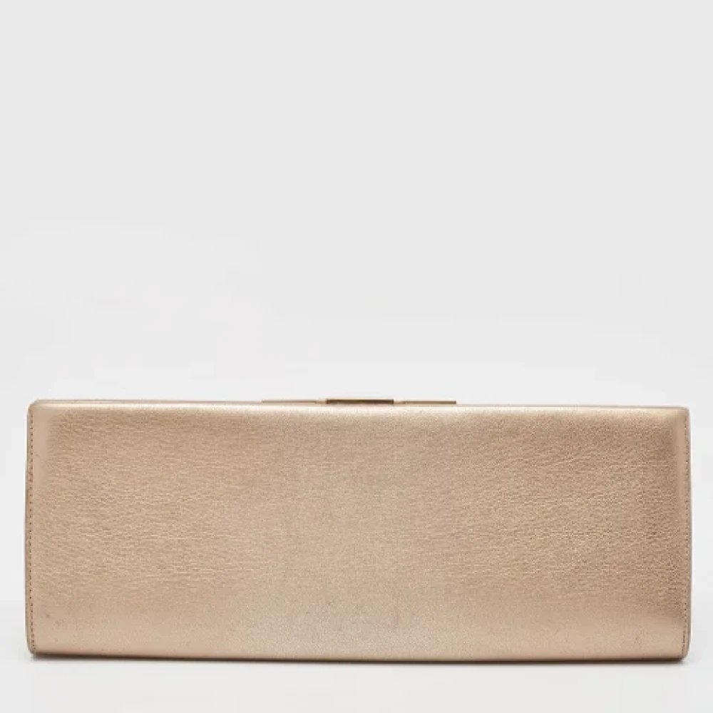 Salvatore Ferragamo Pre-owned Leather clutches Beige Dames
