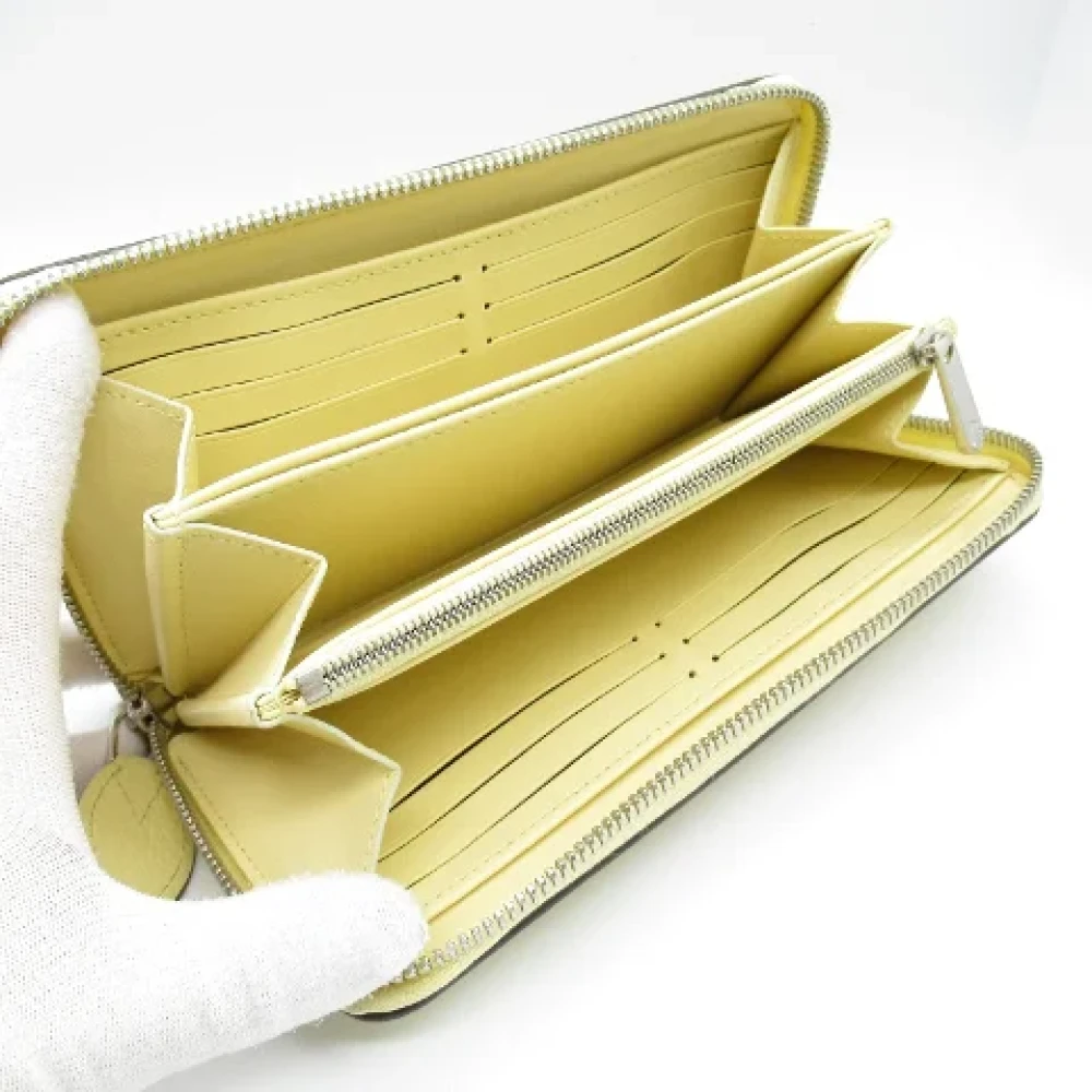 Louis Vuitton Vintage Pre-owned Leather wallets Yellow Dames