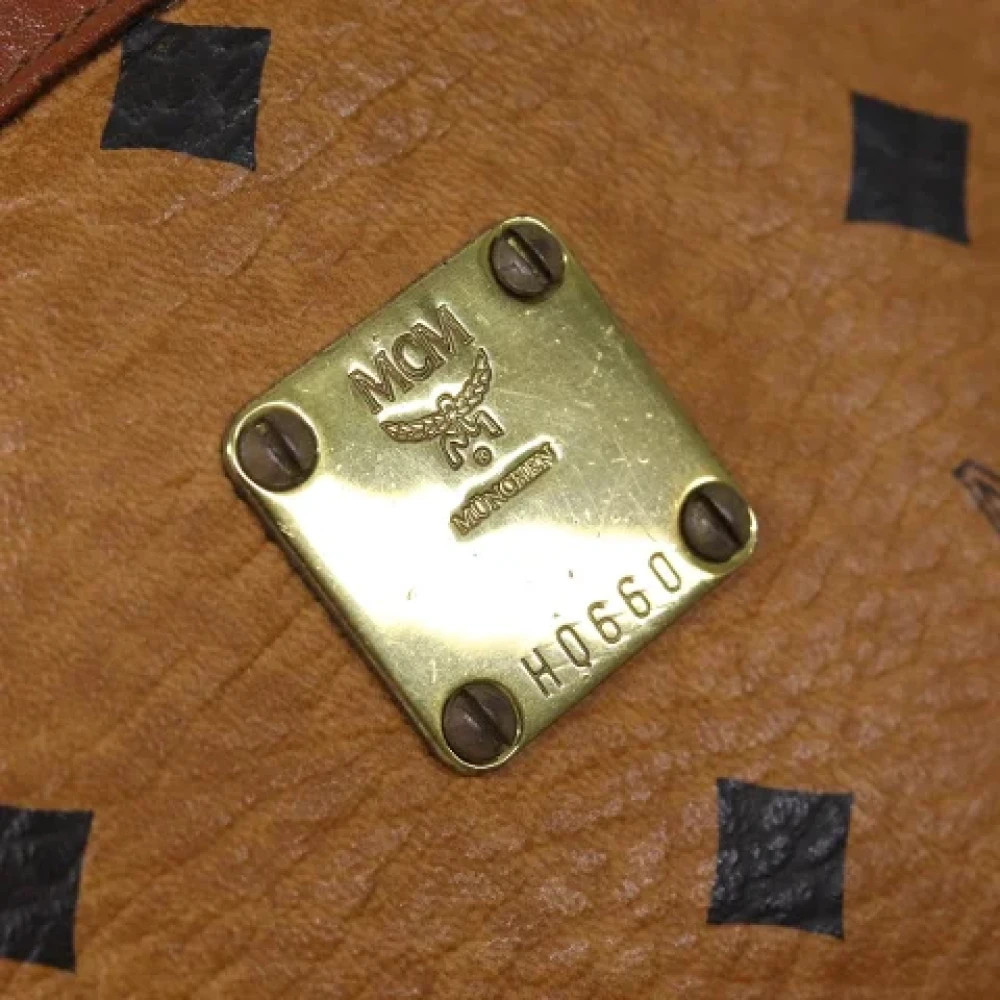MCM Pre-owned Leather clutches Brown Dames
