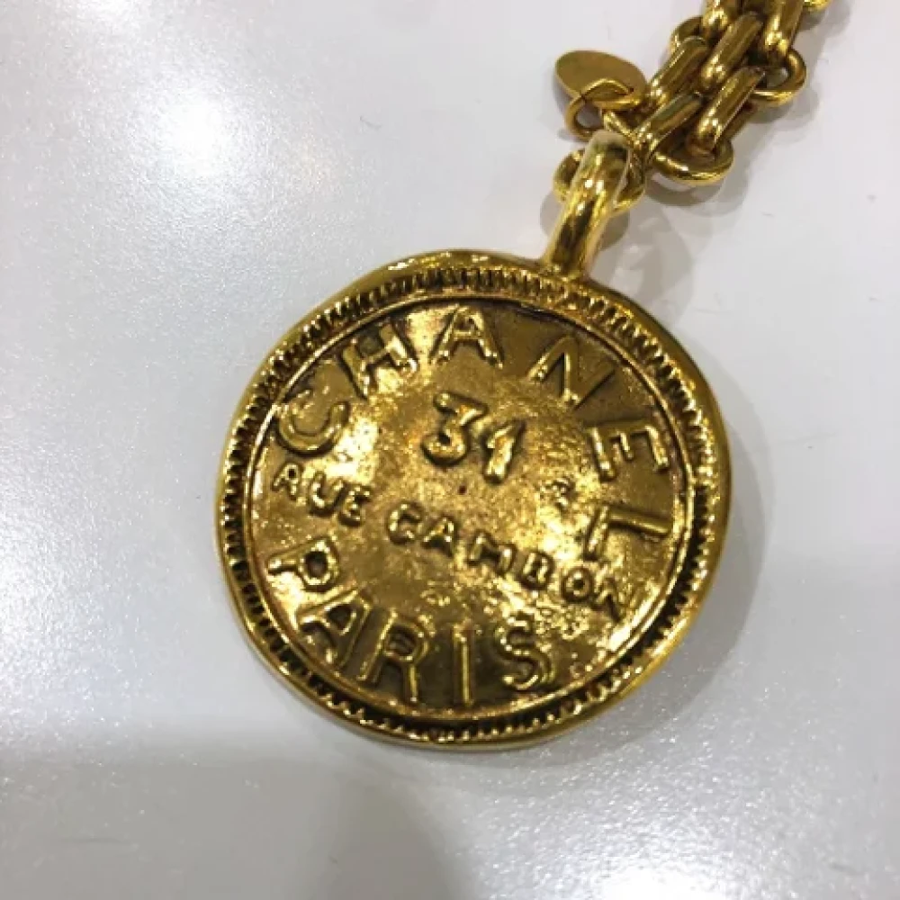 Chanel Vintage Pre-owned Metal key-holders Yellow Dames