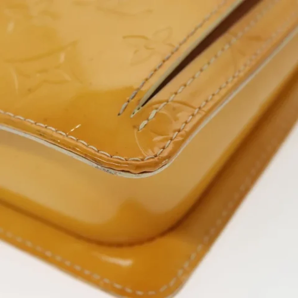 Louis Vuitton Vintage Pre-owned Leather clutches Yellow Dames