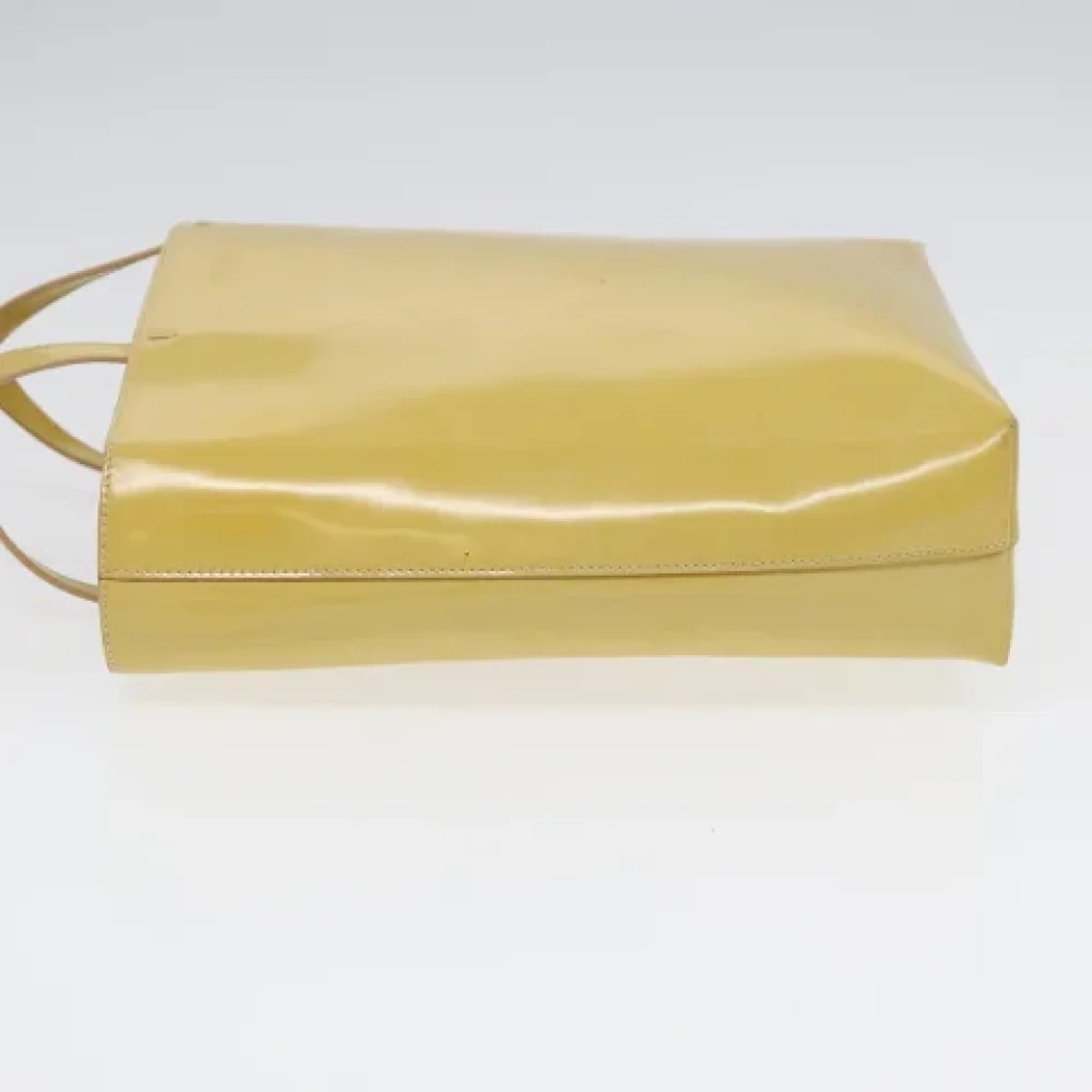 Prada Vintage Pre-owned Coated canvas handbags Yellow Dames