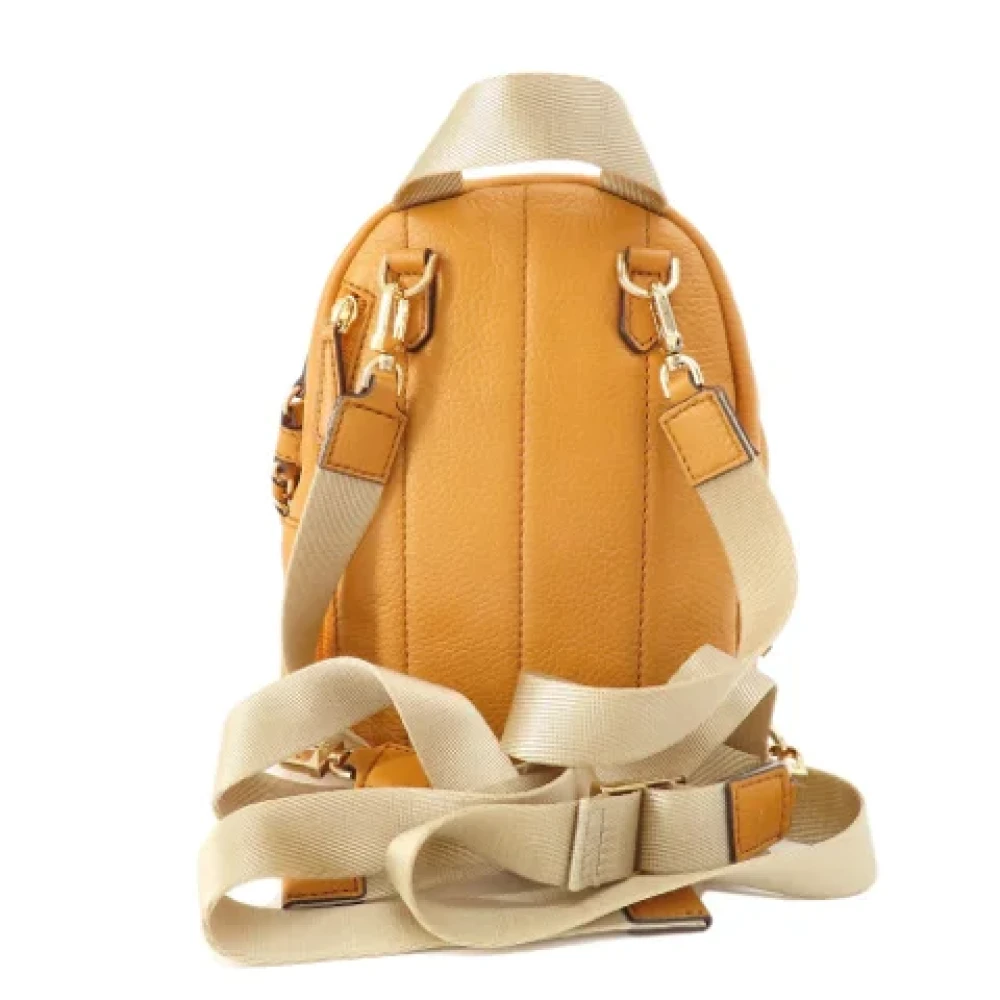 Michael Kors Pre-owned Fabric backpacks Yellow Dames