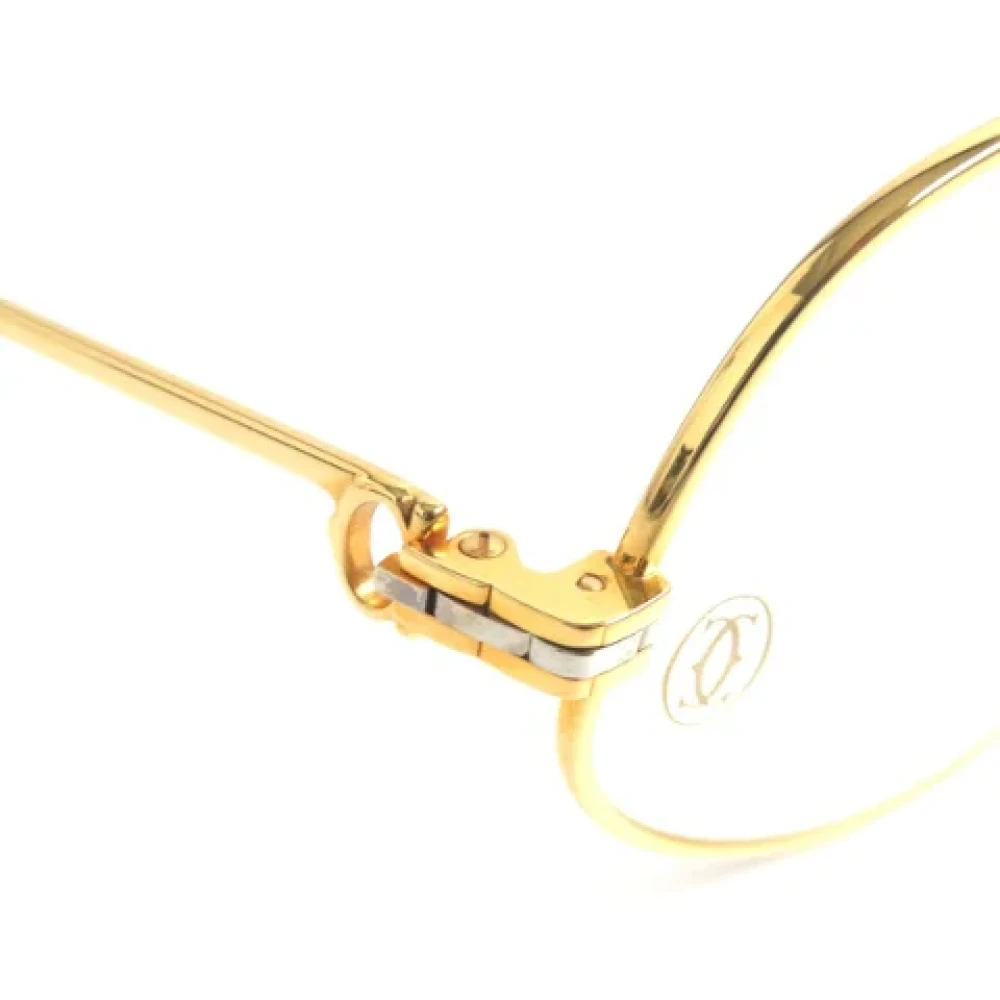 Cartier Vintage Pre-owned Metal sunglasses Yellow Dames