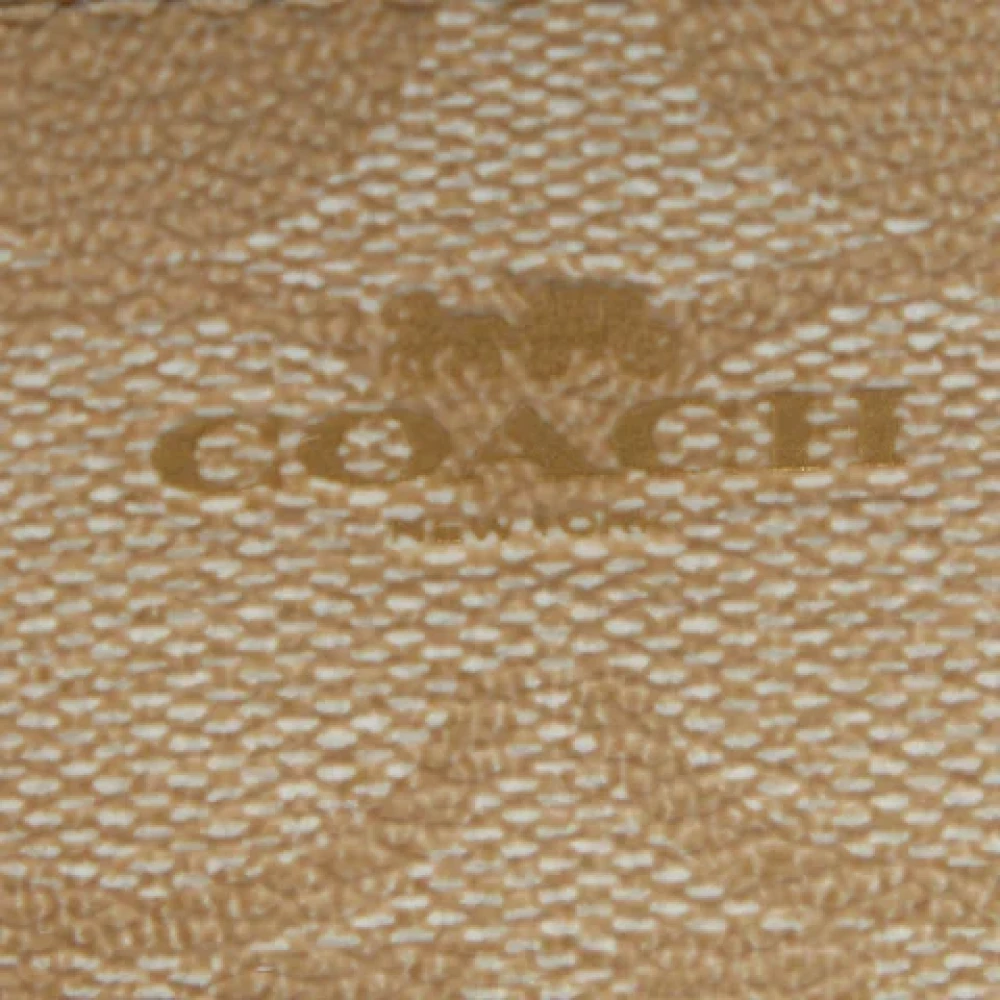 Coach Pre-owned Coated canvas wallets Beige Dames