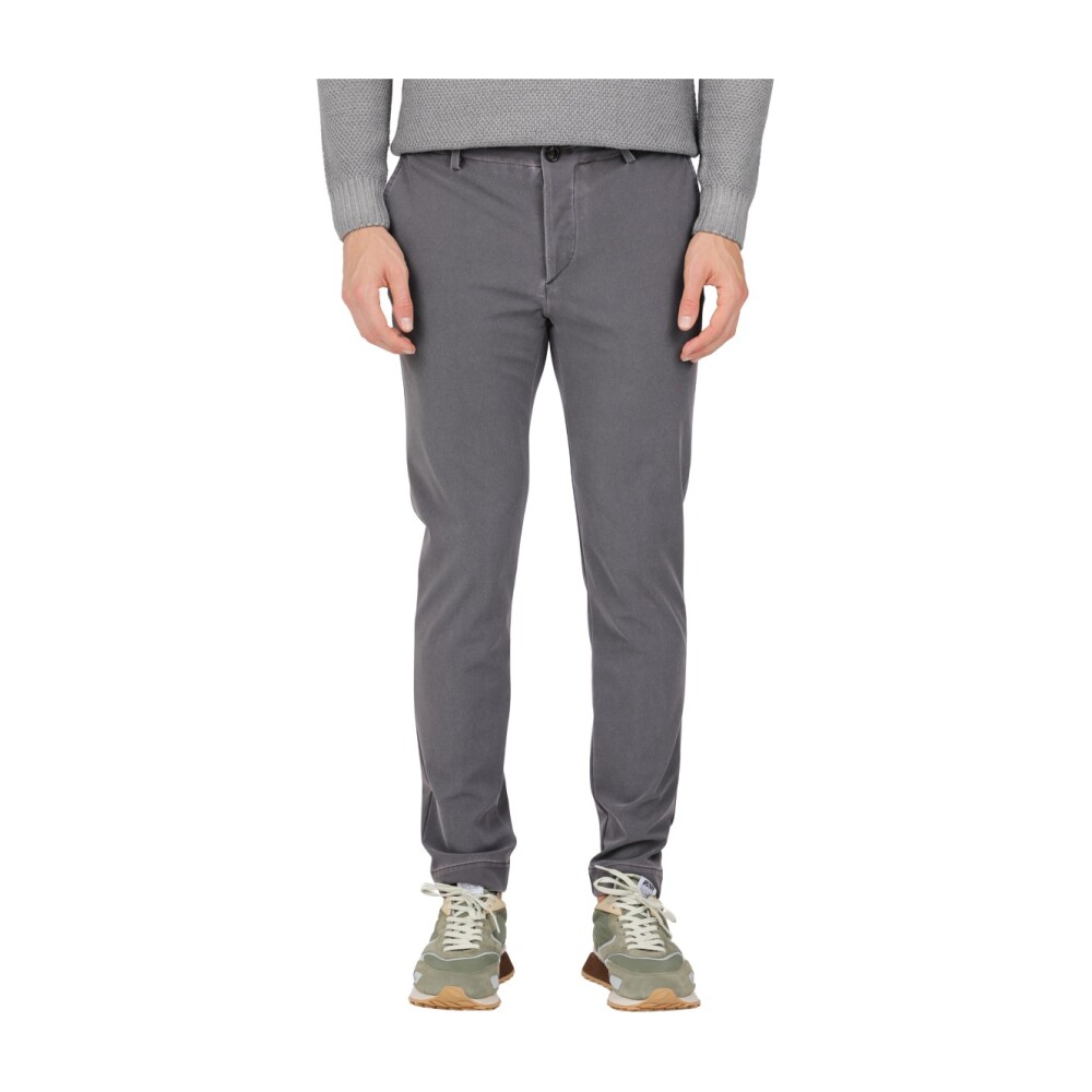 Pants with back clearance flap