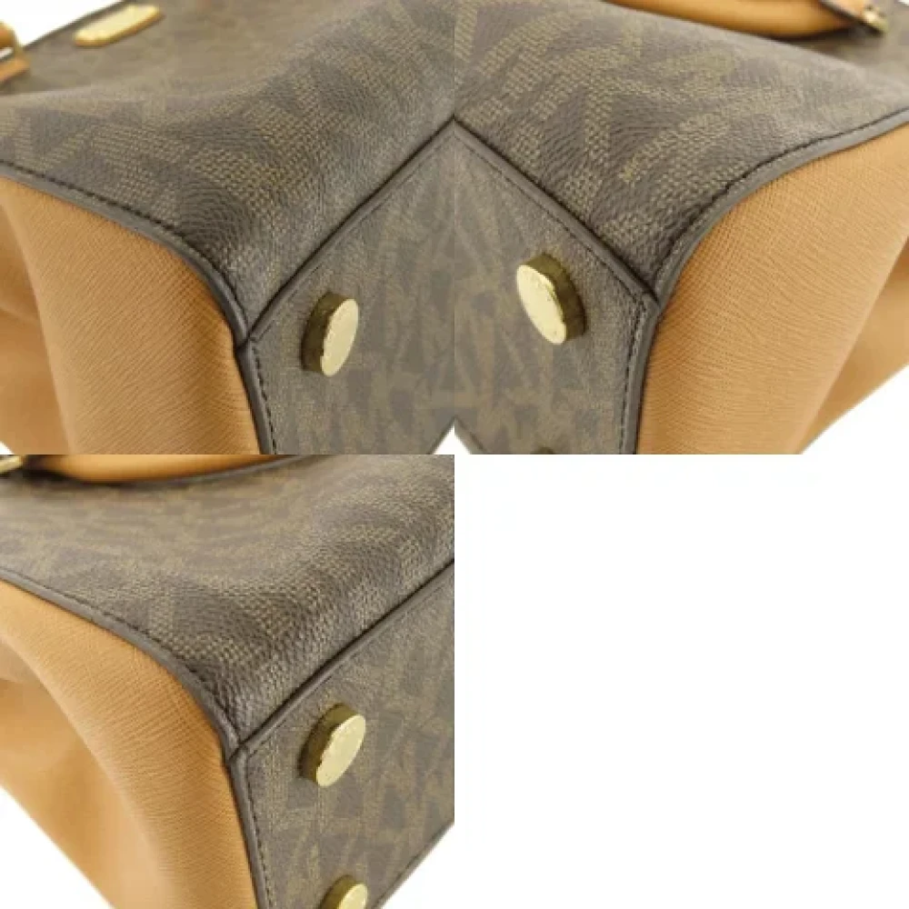Michael Kors Pre-owned Canvas shoulder-bags Brown Dames