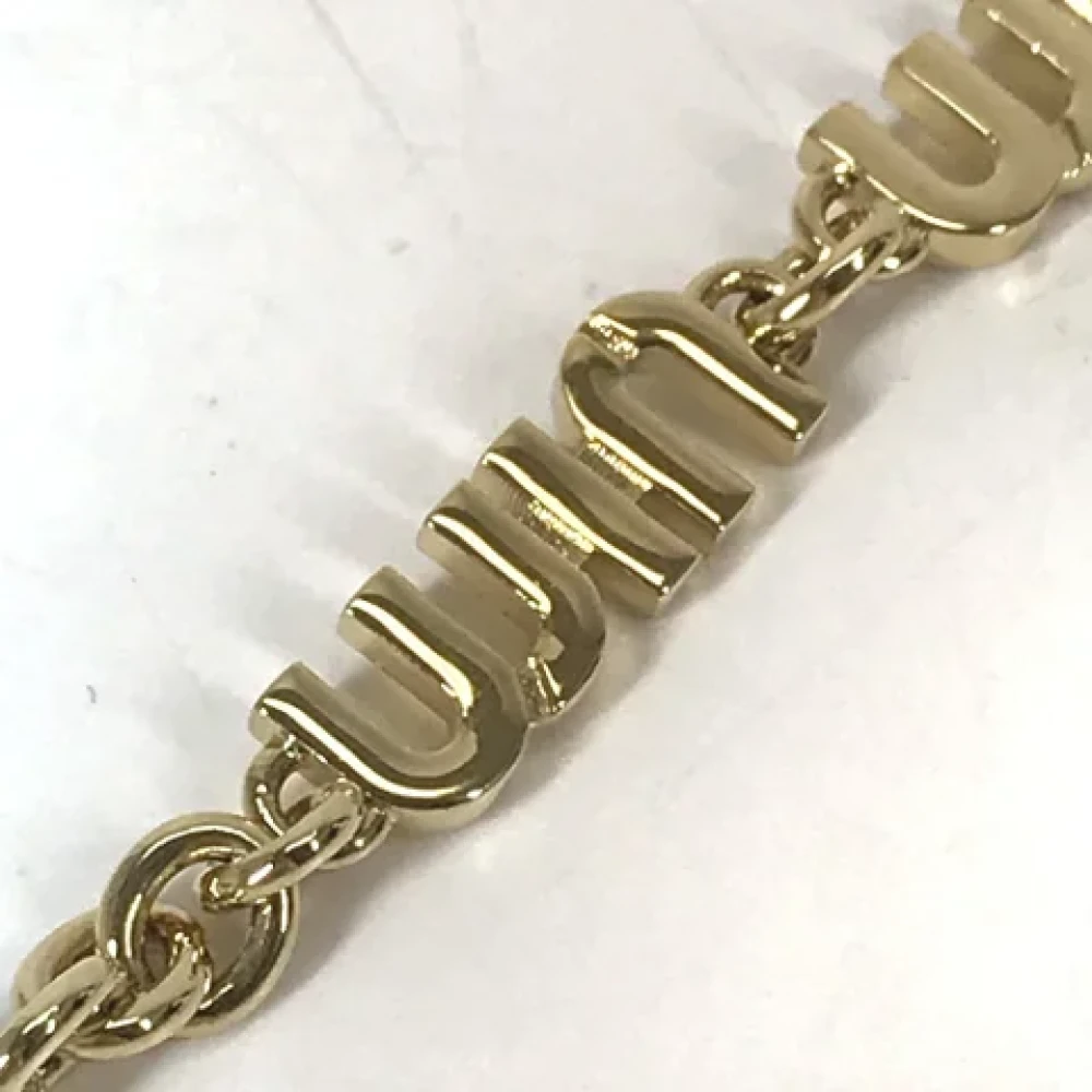 Miu Pre-owned Metal key-holders Yellow Dames