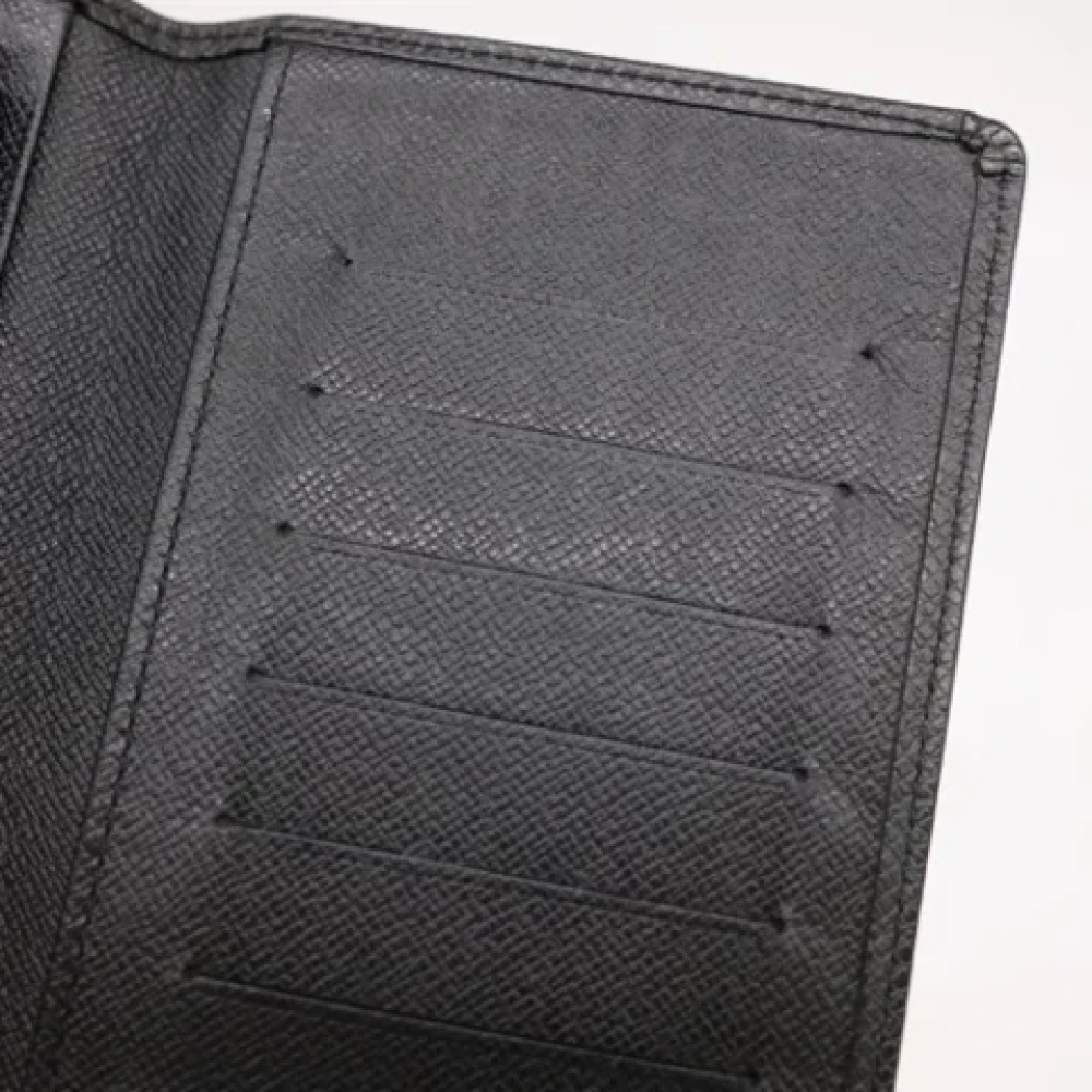 Louis Vuitton Vintage Pre-owned Leather wallets Black Heren