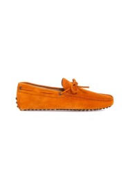 Loafers in natural leather with decorative laces